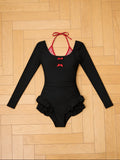 “Women’s long-sleeve swimsuit”